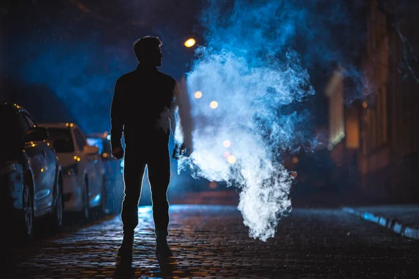 Man Stand Smoke Evening Night Time Telephoto Lens Shot — Stock Photo, Image