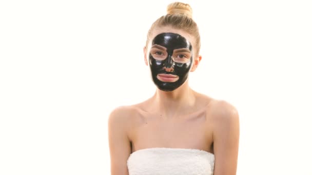 Happy Woman Black Face Care Mask Gesturing White Background — Stock Video