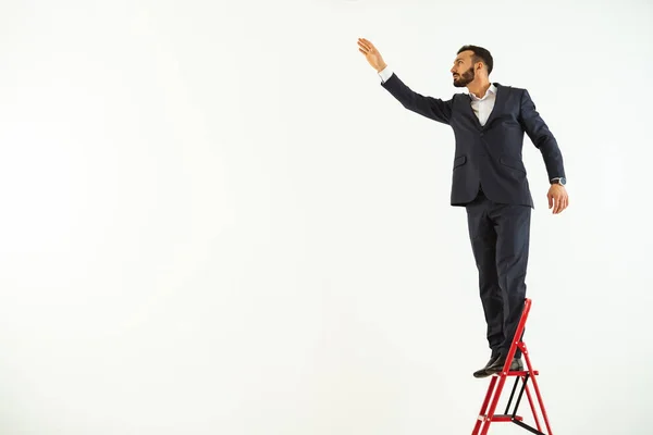 Businessman Standing Red Stepladder — Stock Photo, Image
