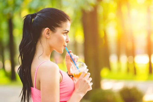 Attractive Sportswoman Drinks Juice Outdoor — Stock Photo, Image