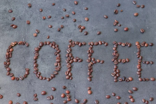 Kahve çekirdekleri harf şeklinde.