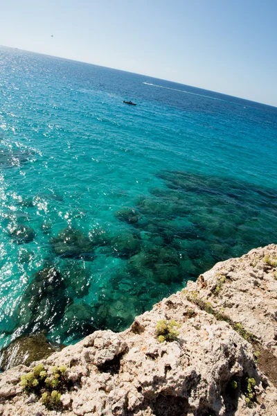 stock image Stone cliff in a beautiful blue sea Cyprus