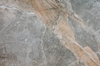 desenleri ve soyutlamaları olan turuncu gri taş döşeme