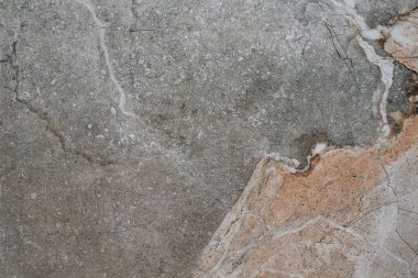 desenleri ve soyutlamaları olan turuncu gri taş döşeme