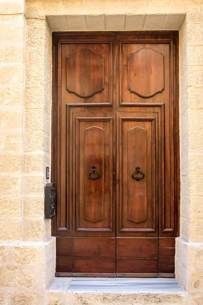 Brown door in Malta