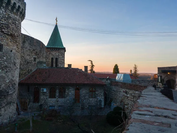 Serbian Orthodox Church of the Holy Mother of God or Church Ruzica or Crkva Ruzica in Belgrade fortress at Kalemegdan park under the Zindan gate, at sunset.