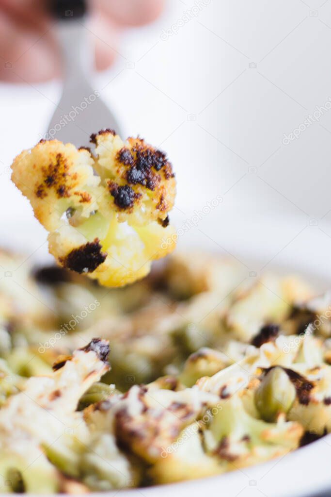 Roasted cauliflower with parmesan and lime juice.