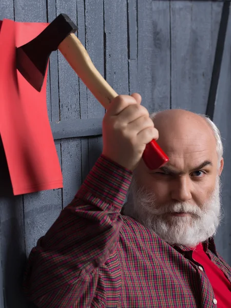Man with axe and paper — Stock Photo, Image
