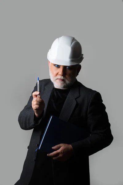 Hombre de sombrero duro con cuaderno —  Fotos de Stock