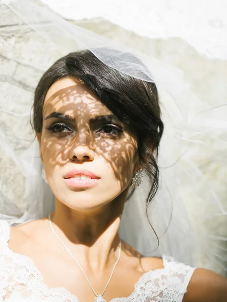 Pretty bride under veil — Stock Photo, Image