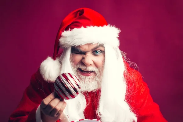 Grimace Christmas man with decorative ball — Stock Photo, Image