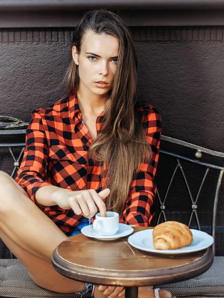 Serious girl in cafe — Stock Photo, Image