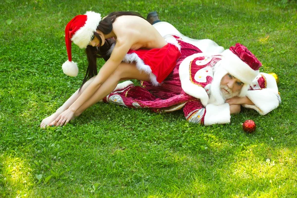 Santa Claus y mujer bonita — Foto de Stock