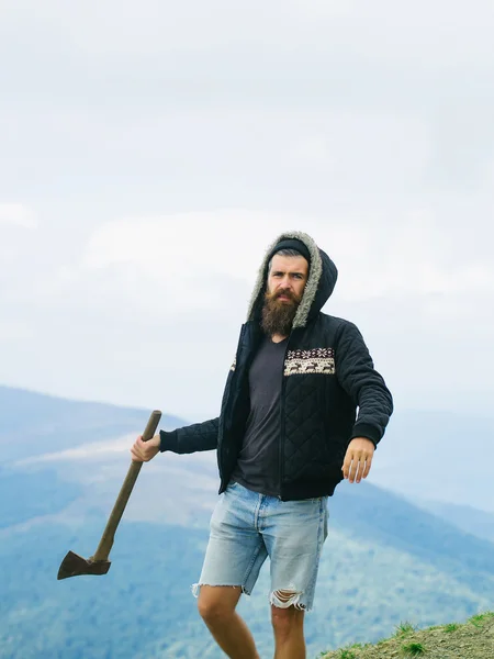 Strong man lumberjack with axe — Stock Photo, Image