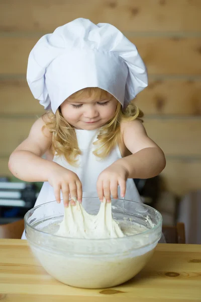 happy boy child cook kneading dough