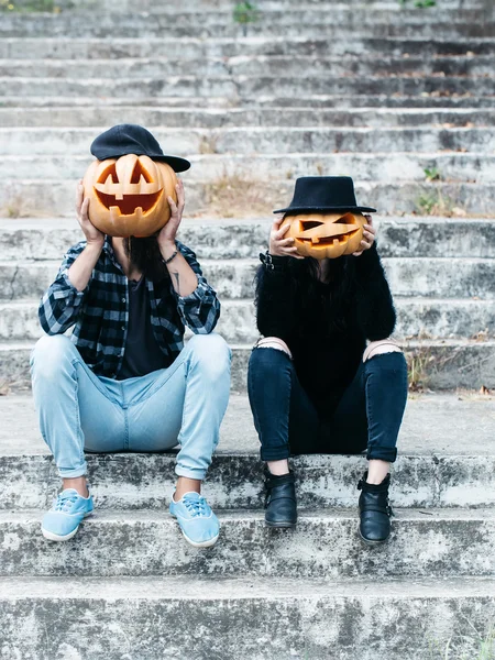 Halloween couple with pumpkin — Stock Photo, Image