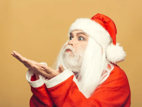 Weihnachtsmann bläst — Stockfoto