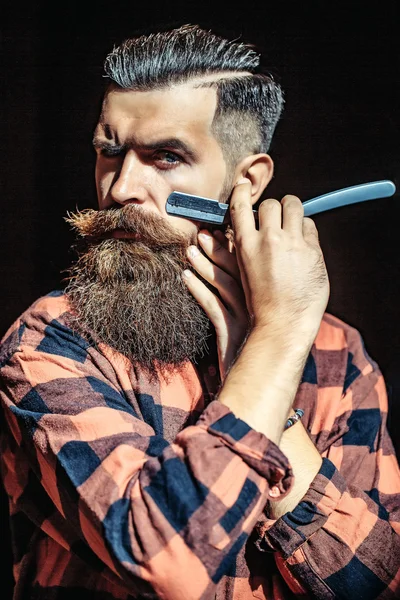 Young man with razor — Stock Photo, Image