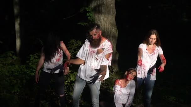 Four bloody zombies in the woods — ストック動画