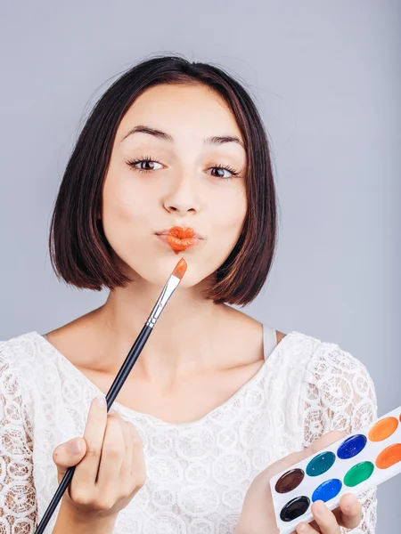 Girl with colorful paints — Stock Photo, Image