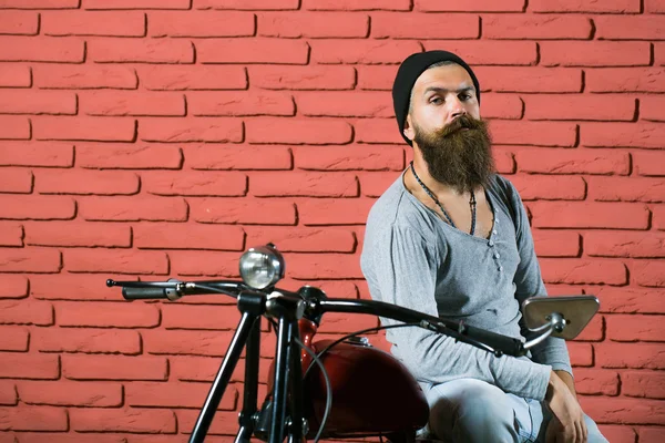 Bearded biker man on motorbike — Stock Photo, Image