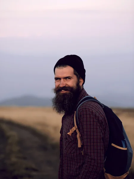 Bearded man on mountain top — Stock Photo, Image
