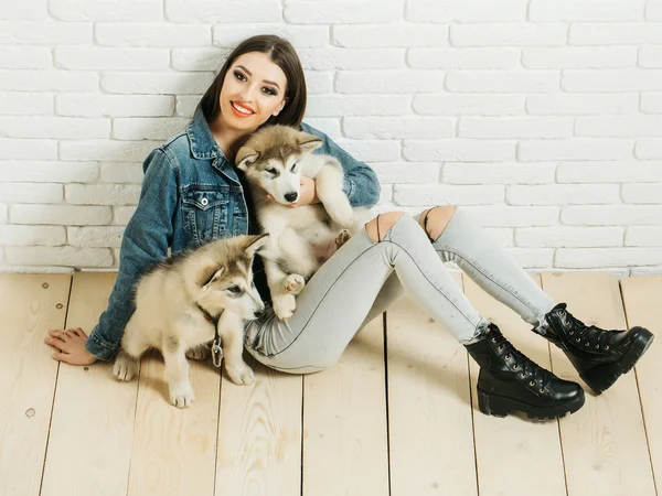 Pretty sexy girl with husky dog — Stock Photo © Tverdohlib.com #128554286