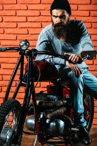 Bearded biker man on motorbike — Stock Photo, Image