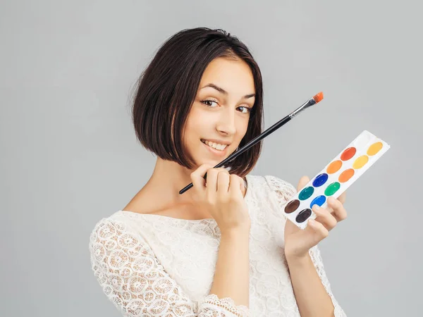 Girl with colorful paints — Stock Photo, Image