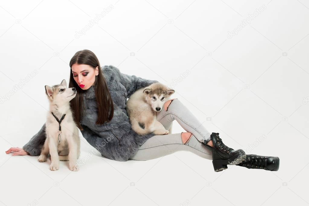 Pretty sexy girl with husky dog — Stock Photo © Tverdohlib.com #128810272