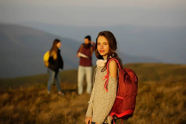 Pretty girl with red backpack — Stock Photo, Image