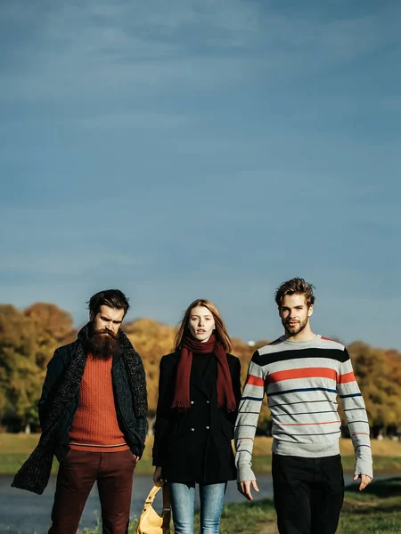 Young people in autumn park