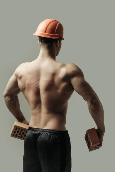 Sexy svalnatý muž stavitel — Stock fotografie