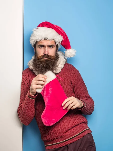 Christmas man with decorative stocking — Stock Photo, Image