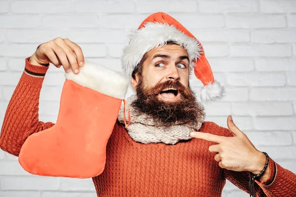 Kerst man met decoratieve kous — Stockfoto