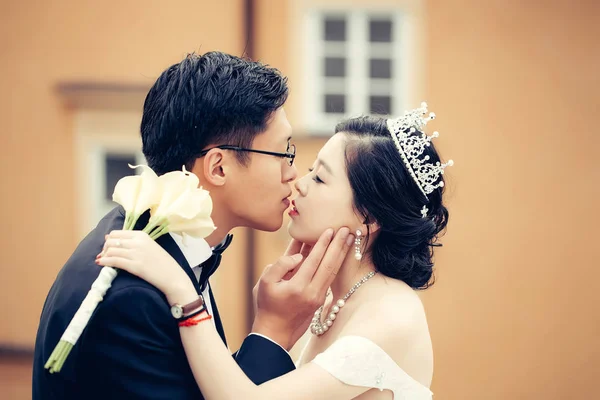 Chinese cute young newlyweds Stock Picture