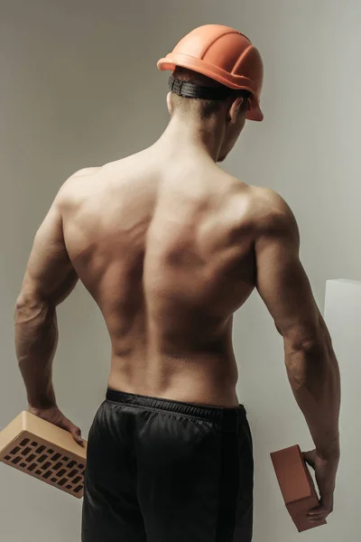 Sexy musculoso hombre constructor — Foto de Stock