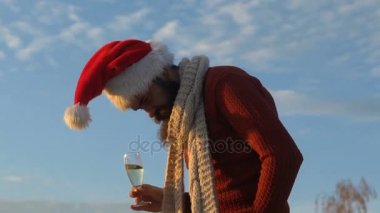 Rock santa başını bir kadeh şampanya ile bir partide hamle.