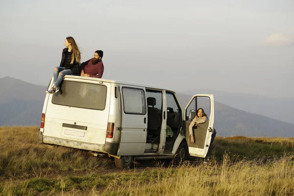 Young people travel by minibus Stock Photo