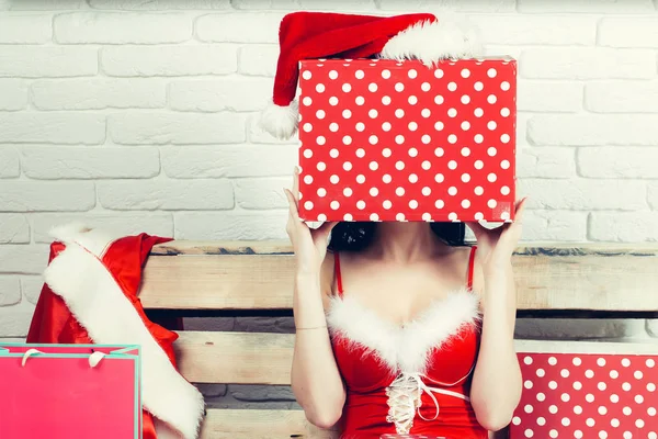 Sexy christmas woman with presents — Stock Photo, Image