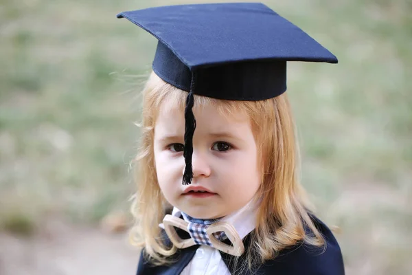 Little boy child in mantle outdoor