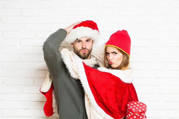 Young upset Christmas couple Royalty Free Stock Photos