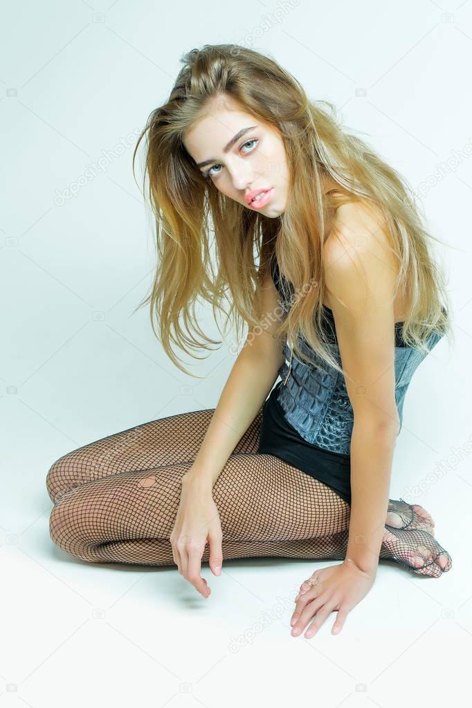 pretty girl in fishnet tights