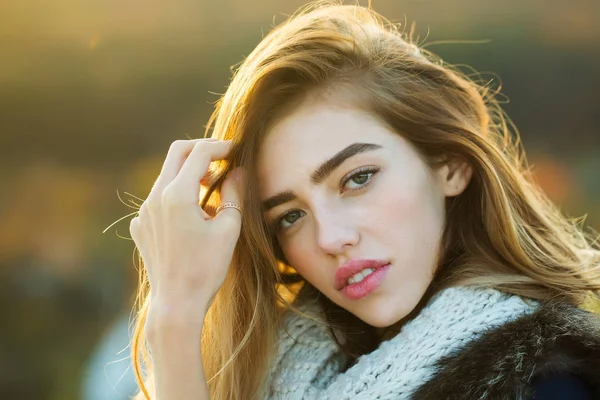 Pretty girl with knitted scarf — Stock Photo, Image