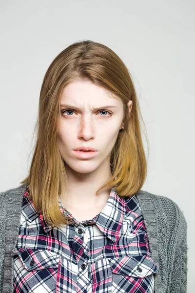 Upset pretty girl frowns — Stock Photo, Image