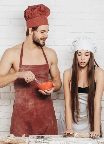 Man and girl on kitchen