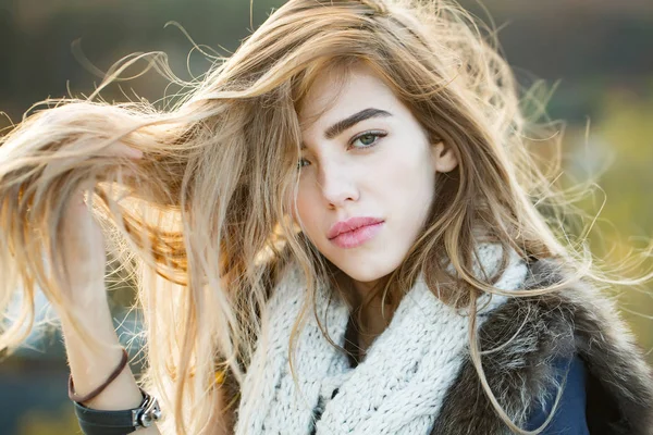 Pretty girl with knitted scarf — Stock Photo, Image