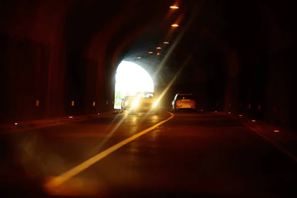 Cars inside tunnel.