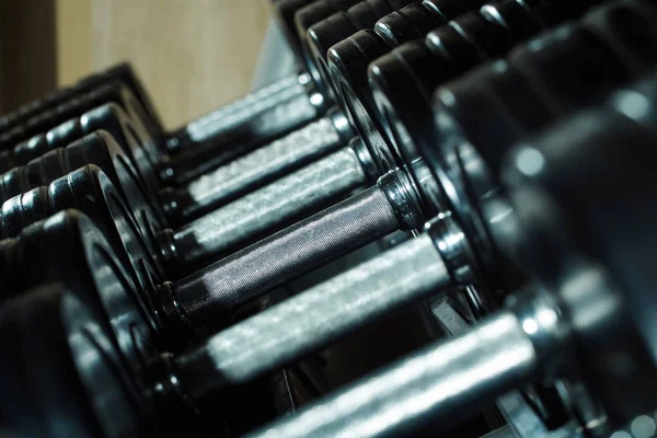 Metallic or steel dumbbells — Stock Photo, Image