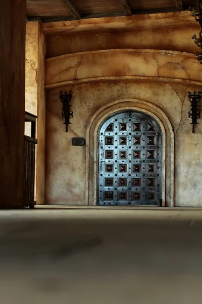 Old wooden arch door